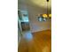 Bright dining room with hardwood floors and a chandelier at 4282 Roswell Ne Rd # G2, Atlanta, GA 30342
