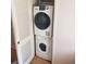 Convenient laundry closet with stacked washer and dryer at 4282 Roswell Ne Rd # G2, Atlanta, GA 30342