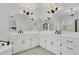 Bright bathroom featuring a soaking tub, double vanity, and oversized mirrors at 4440 Ormond Ne Trce, Marietta, GA 30066