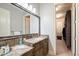 Double vanity bathroom with a walk-in closet and natural light at 4668 Andrea Pointe, Marietta, GA 30062