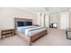 Main bedroom with wood bed frame and neutral color scheme at 4668 Andrea Pointe, Marietta, GA 30062