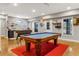 Entertaining space with pool table, foosball table, and custom lighting at 4924 Red Cliff Ct, Powder Springs, GA 30127