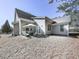 Relaxing backyard patio with seating area and umbrella at 217 Towering Peaks, Canton, GA 30114