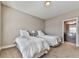 Two twin beds in a well-lit bedroom with ensuite bathroom at 217 Towering Peaks, Canton, GA 30114