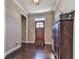 Spacious entryway with hardwood floors and a wooden door at 217 Towering Peaks, Canton, GA 30114