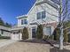 House exterior showcasing a driveway, landscaping, and neighborhood context at 217 Towering Peaks, Canton, GA 30114