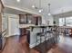 Spacious kitchen with island, stainless steel appliances, and dark wood cabinets at 217 Towering Peaks, Canton, GA 30114