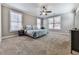 Large main bedroom with ceiling fan and ample natural light at 217 Towering Peaks, Canton, GA 30114