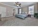 Spacious main bedroom with carpet and ensuite bathroom access at 217 Towering Peaks, Canton, GA 30114