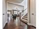 View down hardwood stairs into living room at 217 Towering Peaks, Canton, GA 30114