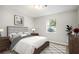 Bright bedroom with wood floors and neutral walls at 2698 George Nw St, Atlanta, GA 30318