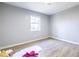 Second bedroom with grey walls and wood floors at 2698 George Nw St, Atlanta, GA 30318