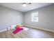 Bright bedroom with grey walls and wood floors at 2698 George Nw St, Atlanta, GA 30318