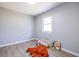 Spacious bedroom with light grey walls and wood floors at 2698 George Nw St, Atlanta, GA 30318