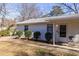 Side view of white brick duplex with shrubbery at 2698 George Nw St, Atlanta, GA 30318