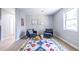 Living room with two armchairs and colorful rug at 2698 George Nw St, Atlanta, GA 30318