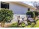 Relaxing patio with wicker chairs and greenery at 2698 George Nw St, Atlanta, GA 30318