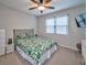 Bedroom with a queen bed, ceiling fan and window at 3700 Ashley Woods Dr, Powder Springs, GA 30127