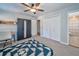 Bedroom with a queen bed, built-in closet and access to bath at 3700 Ashley Woods Dr, Powder Springs, GA 30127