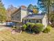 House exterior features gray siding, a blue door, and a well-maintained lawn at 3700 Ashley Woods Dr, Powder Springs, GA 30127