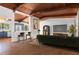 Living room featuring wood floors, fireplace, wood ceiling beams, and open kitchen at 3732 Summitridge Dr, Atlanta, GA 30340