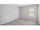 Simple bedroom with neutral walls and carpet at 4367 Favored Way, Union City, GA 30291