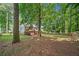 Large backyard with a wooden fence at 45 Ashbury Ct, Dallas, GA 30157