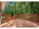 Wooden deck overlooking a fenced backyard at 45 Ashbury Ct, Dallas, GA 30157