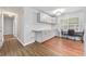 Kitchen dining area with gray cabinets and laminate floors at 45 Ashbury Ct, Dallas, GA 30157