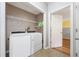 Laundry room with washer, dryer and shelving at 45 Ashbury Ct, Dallas, GA 30157