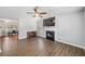 Open living area with a fireplace and laminate floors at 45 Ashbury Ct, Dallas, GA 30157