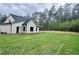 Expansive backyard with lush green lawn, offering plenty of space for recreation and relaxation at 130 West Lake Blvd, Carrollton, GA 30116