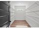 Spacious walk-in closet with wire shelving for organized storage at 130 West Lake Blvd, Carrollton, GA 30116
