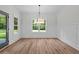 Elegant dining room with modern lighting and large windows at 130 West Lake Blvd, Carrollton, GA 30116