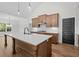 Elegant kitchen island with quartz countertops and pendant lighting at 130 West Lake Blvd, Carrollton, GA 30116