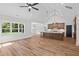 Bright, open-concept living space with modern kitchen and vaulted ceilings at 130 West Lake Blvd, Carrollton, GA 30116