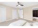 Bedroom with a ceiling fan and multiple closets, offering ample storage and organization at 2657 Lenox Ne Rd # A-9, Atlanta, GA 30324