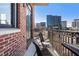 Cozy balcony with city views, wrought iron fencing and stylish seating, perfect for relaxation at 3235 Roswell Ne Rd # 617, Atlanta, GA 30305