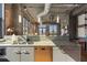 Modern kitchen features stainless steel appliances and stone countertops at 3235 Roswell Ne Rd # 617, Atlanta, GA 30305