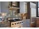 Close-up of the gourmet kitchen with stainless steel appliances and granite countertops at 3235 Roswell Ne Rd # 617, Atlanta, GA 30305