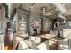 Spacious living room with open layout, fireplace, and access to modern kitchen at 3235 Roswell Ne Rd # 617, Atlanta, GA 30305