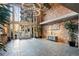 Modern lobby with exposed brick, high ceilings, and a statement lighting fixture at 3235 Roswell Ne Rd # 617, Atlanta, GA 30305