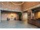 Modern lobby with exposed brick, high ceilings, and a seating area at 3235 Roswell Ne Rd # 617, Atlanta, GA 30305
