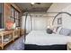 Main bedroom featuring exposed brick, natural light and minimalist decor at 3235 Roswell Ne Rd # 617, Atlanta, GA 30305
