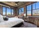 Charming main bedroom featuring exposed brick, lots of light, and modern fixtures at 3235 Roswell Ne Rd # 617, Atlanta, GA 30305