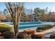 Community pool area showcasing a water slide and well-maintained landscaping at 4130 Summit Gate Dr, Suwanee, GA 30024