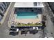 Overhead view of community pool, deck, and surrounding area at 1213 Van Allen Nw Mews # 47, Atlanta, GA 30318
