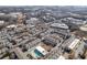Aerial view of townhomes and community pool with city views at 1213 Van Allen Nw Mews # 47, Atlanta, GA 30318