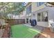 Private backyard with artificial turf and grill at 1213 Van Allen Nw Mews # 47, Atlanta, GA 30318