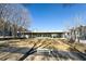 Modern community courtyard with benches and open green space at 1213 Van Allen Nw Mews # 47, Atlanta, GA 30318